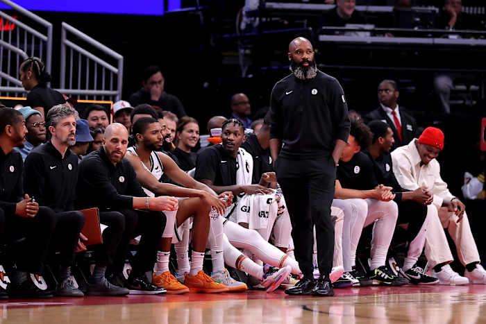 Brooklyn Nets head coach Jacque Vaughn watches the action from the bench against the Houston Rockets during the second quarter at Toyota Center.